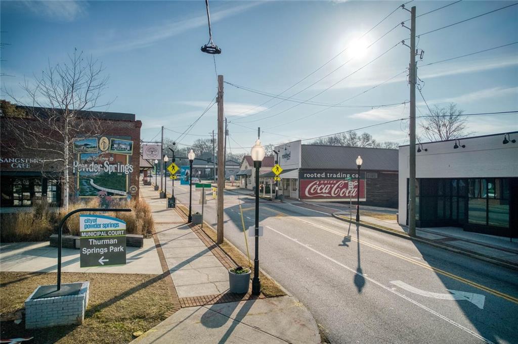3831 Dillard Street Powder Springs, GA 30127 - Photo 27 of 30 a view of a patio with a table and chairs