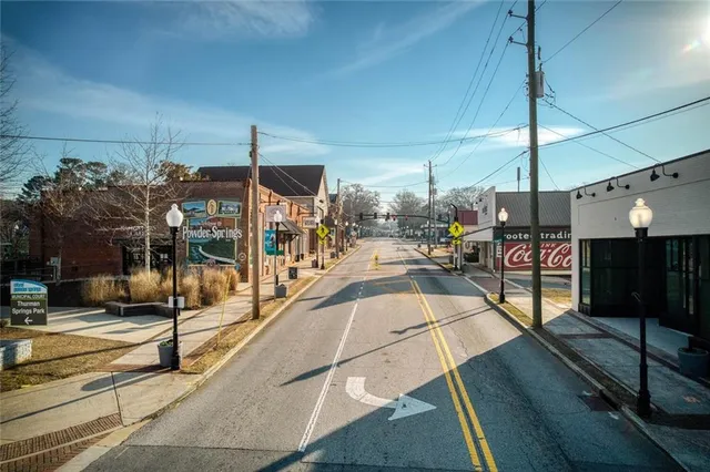 a view of a living room with balcony