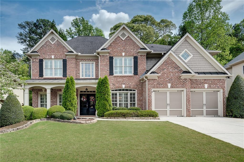 3315 Thimbleberry Trail Dacula, GA 30019 - Photo 1 of 59 front view of a house with a yard