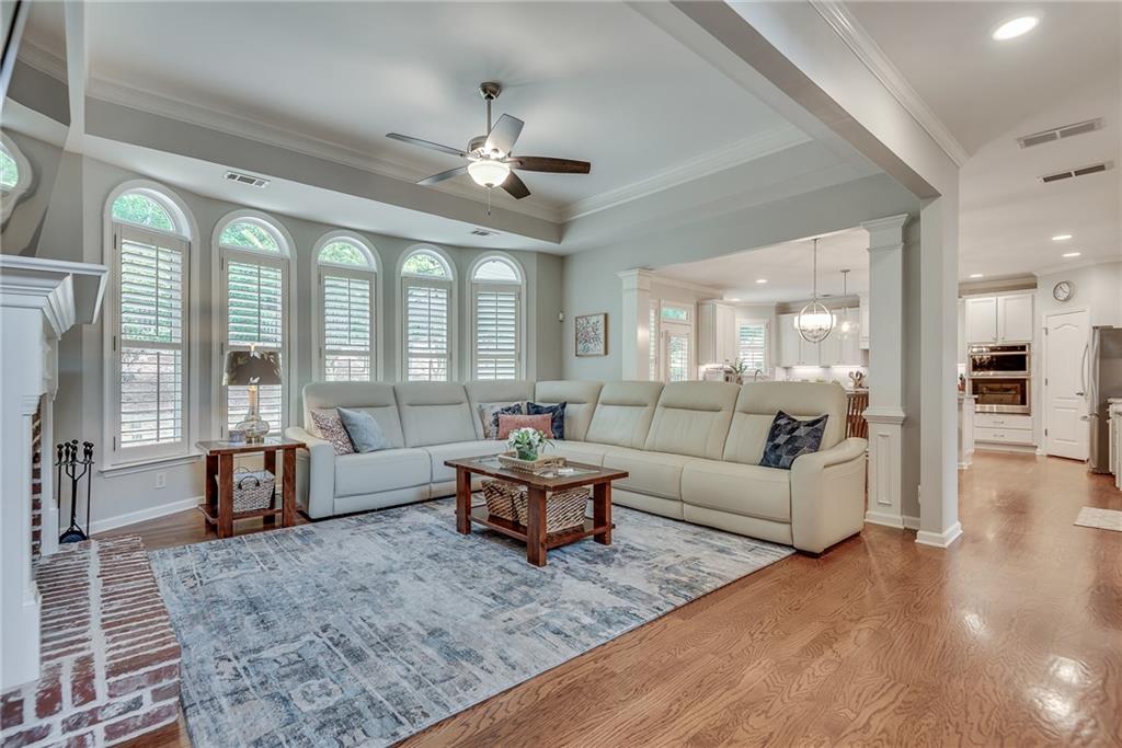 3315 Thimbleberry Trail Dacula, GA 30019 - Photo 12 of 59 a living room with furniture and a large window
