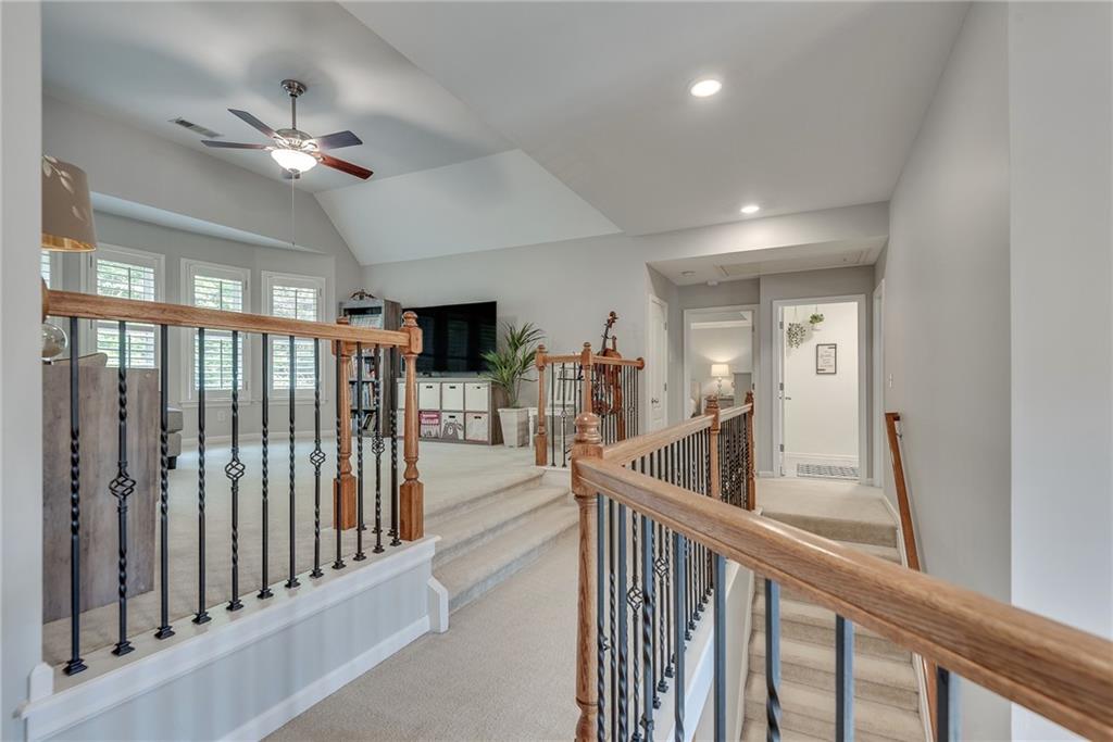 3315 Thimbleberry Trail Dacula, GA 30019 - Photo 27 of 59 a view of a hallway with wooden floor and entryway