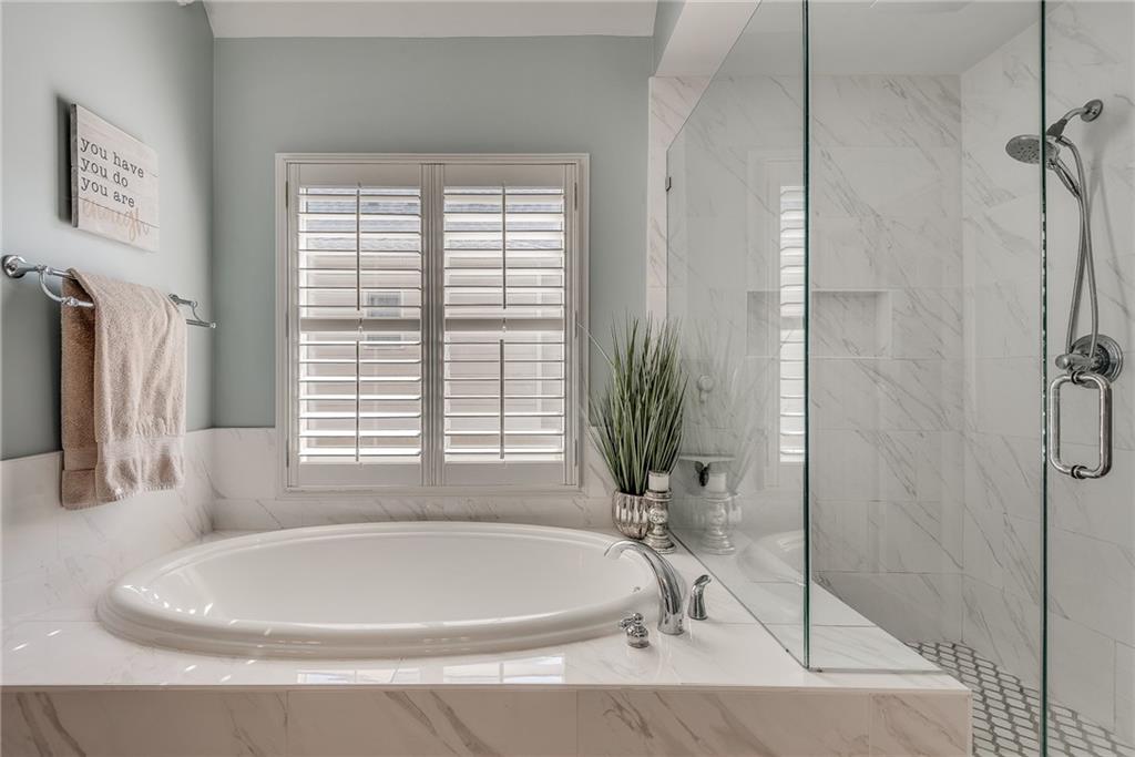 3315 Thimbleberry Trail Dacula, GA 30019 - Photo 43 of 59 a bath tub sitting next to a window