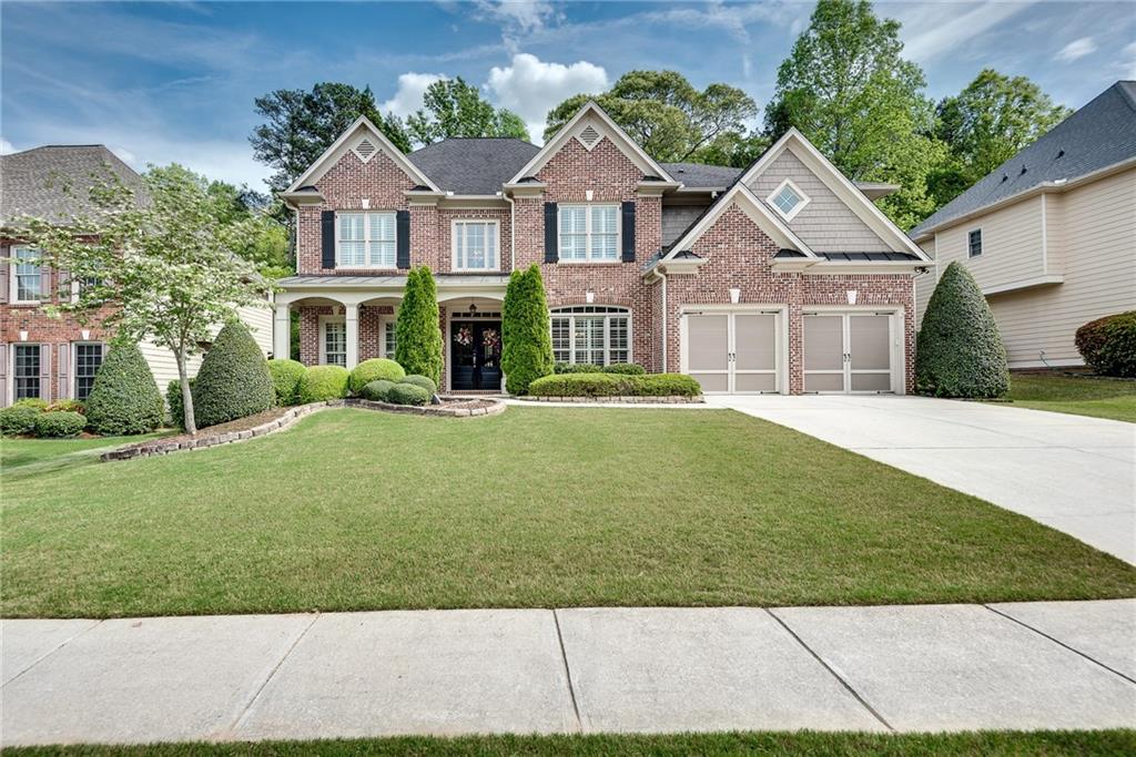 3315 Thimbleberry Trail Dacula, GA 30019 - Photo 54 of 59 front view of a house with a yard