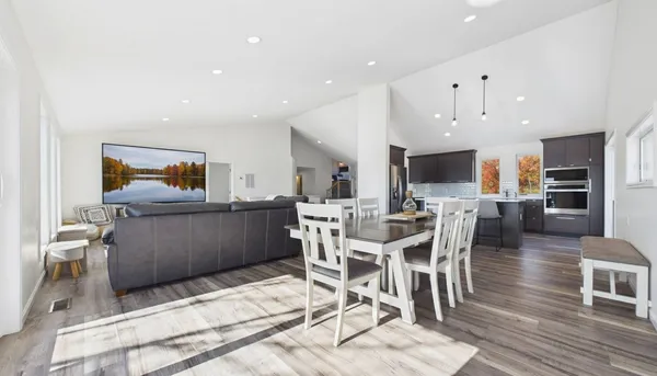 a room with a sink and a mirror