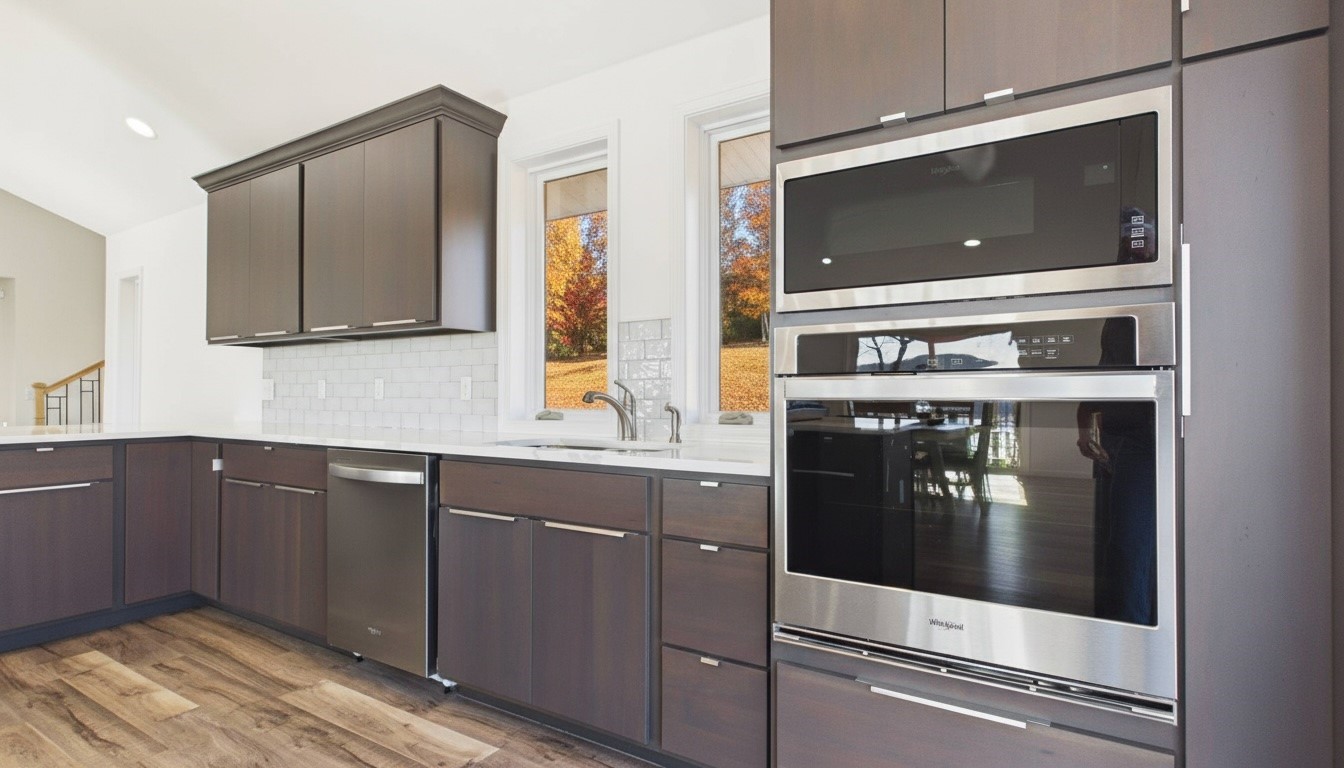 346 Deer Run Road Eddyville, KY 42038 - Photo 15 of 76 a kitchen with stainless steel appliances granite countertop a stove and a microwave