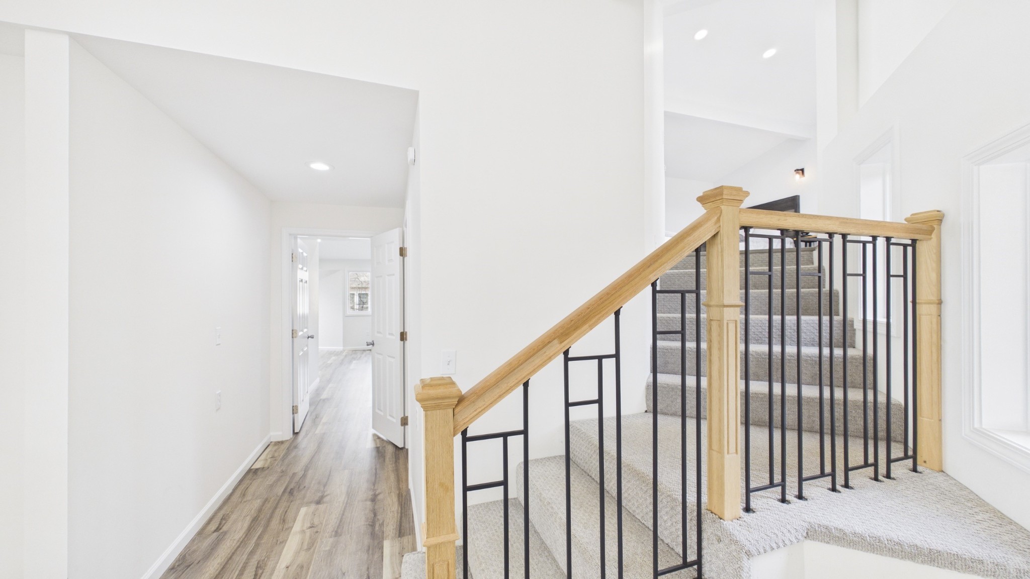 346 Deer Run Road Eddyville, KY 42038 - Photo 26 of 76 a view of staircase with railing and white walls
