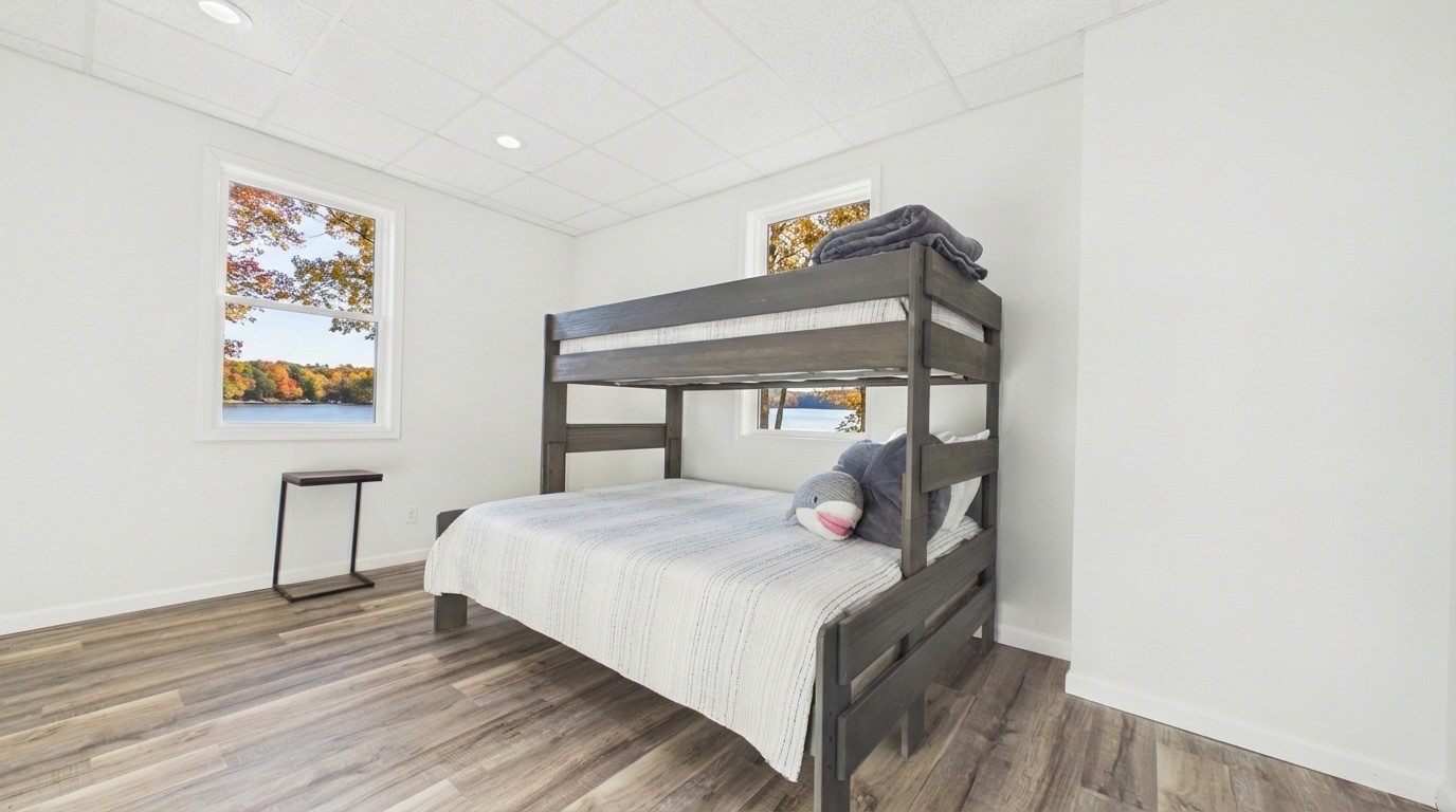 346 Deer Run Road Eddyville, KY 42038 - Photo 35 of 76 a bedroom with a bed and a table