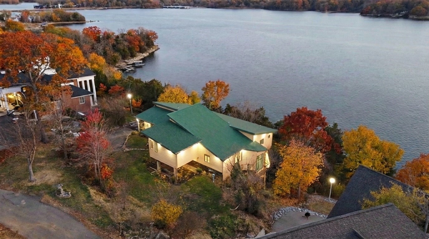 346 Deer Run Road Eddyville, KY 42038 - Photo 47 of 76 an aerial view of a house with a yard and lake view