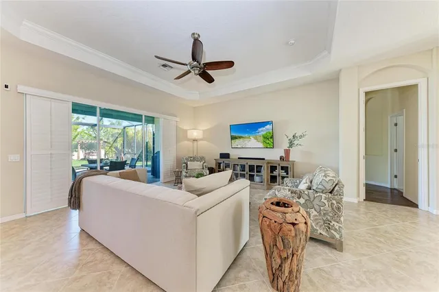 a bedroom with a large bed and a large window