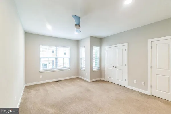 a view of a brick building from a balcony