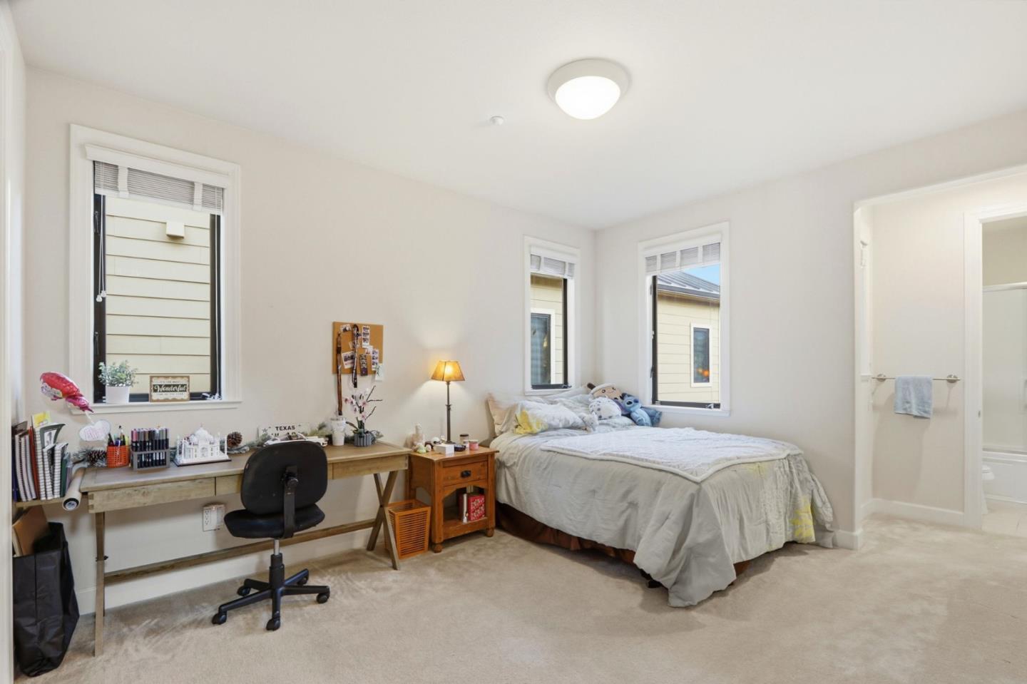 409 Spruce Lane Palo Alto, CA 94306 - Photo 29 of 52 a bedroom with a bed and a desk