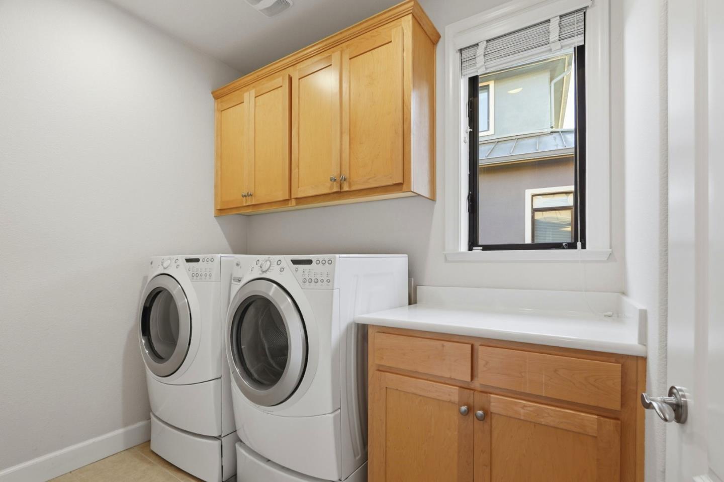 409 Spruce Lane Palo Alto, CA 94306 - Photo 37 of 52 a utility room with dryer and washer