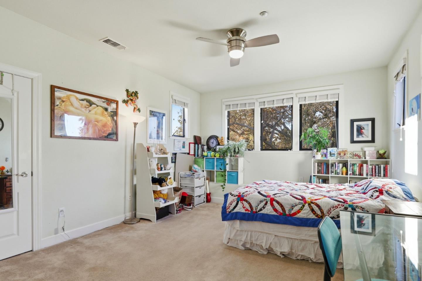 409 Spruce Lane Palo Alto, CA 94306 - Photo 40 of 52 a living room with furniture a flat screen tv and a window