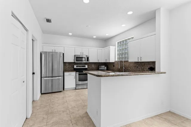 a view of livingroom with furniture and rug floor