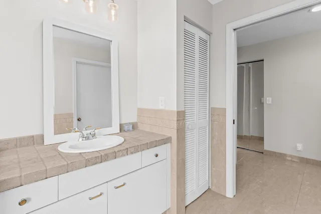 an aerial view of residential houses with yard