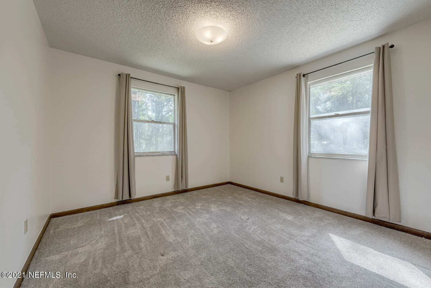 540259 Lem Turner Road Callahan, FL 32011 - Photo 17 of 40 an empty room with windows
