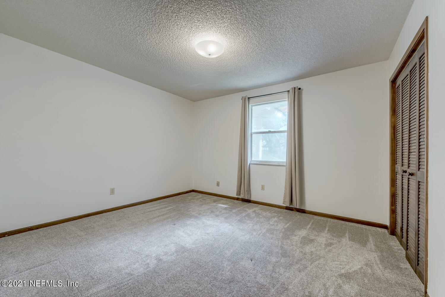 540259 Lem Turner Road Callahan, FL 32011 - Photo 19 of 40 a view of an empty room with a window