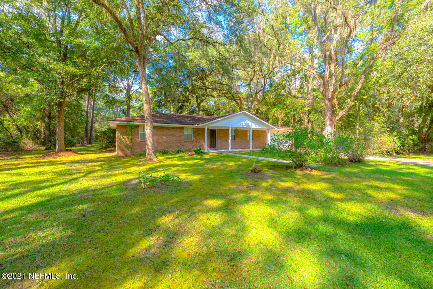 540259 Lem Turner Road Callahan, FL 32011 - Photo 31 of 40 a house view with swimming pool in front of it