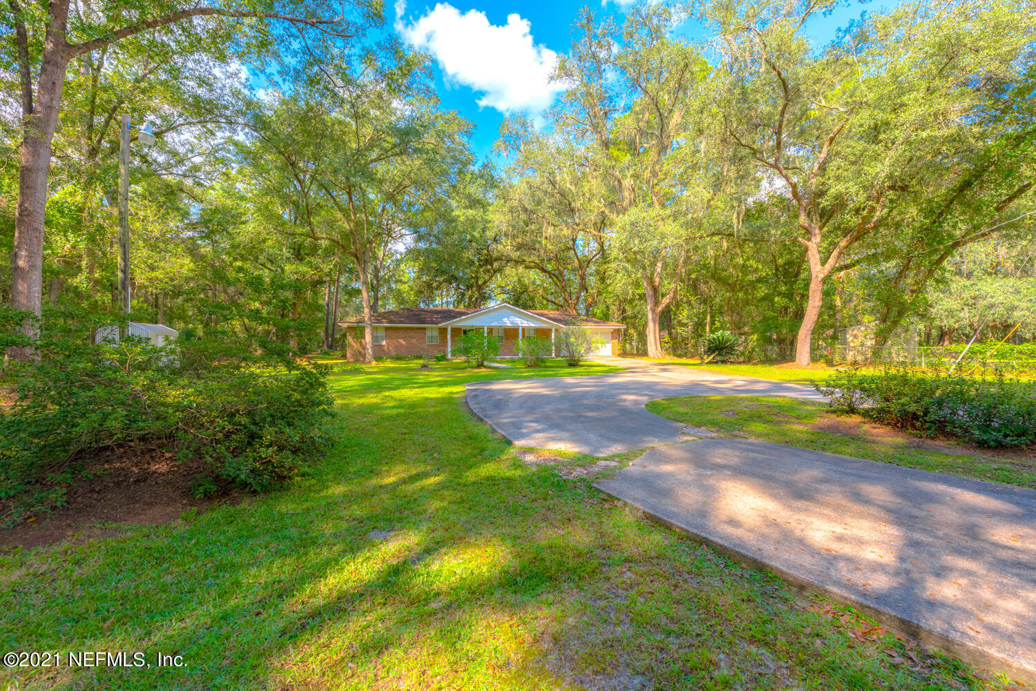 540259 Lem Turner Road Callahan, FL 32011 - Photo 33 of 40 a view of yard with green space and trees all around