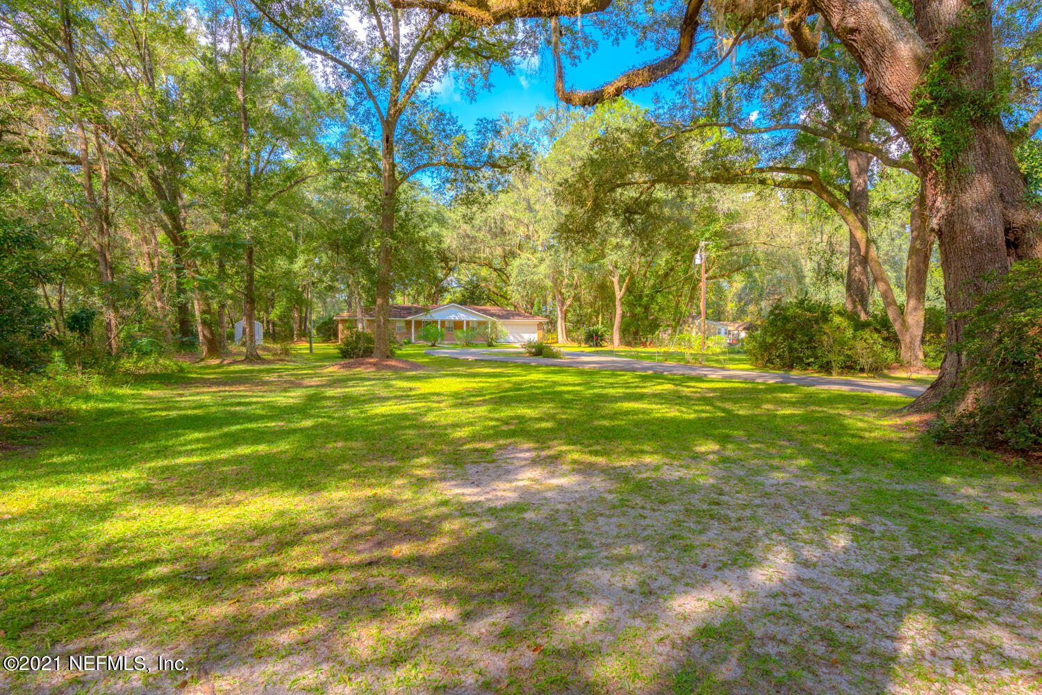 540259 Lem Turner Road Callahan, FL 32011 - Photo 34 of 40 a backyard of water fountain and trees