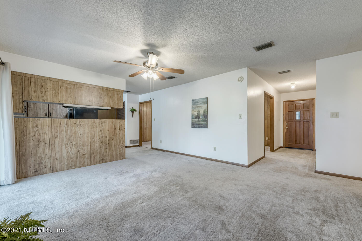 540259 Lem Turner Road Callahan, FL 32011 - Photo 9 of 40 a view of a livingroom with a ceiling fan