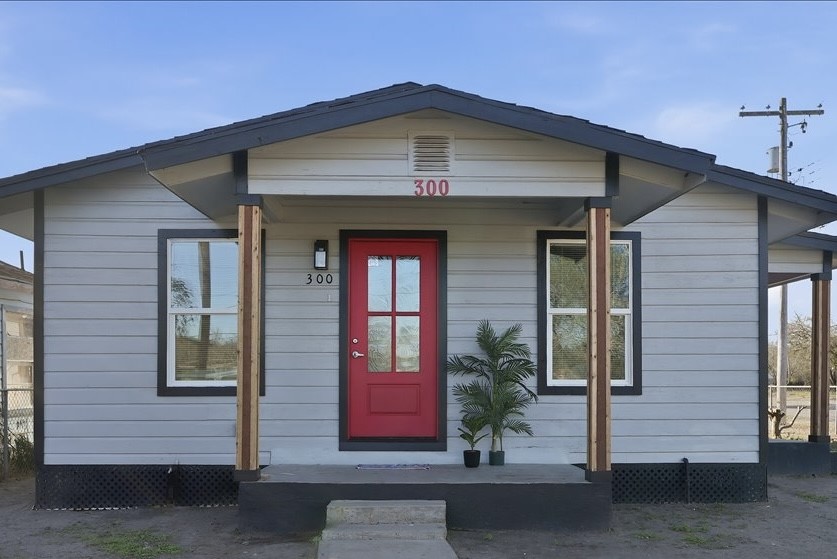 a front view of a house with garage
