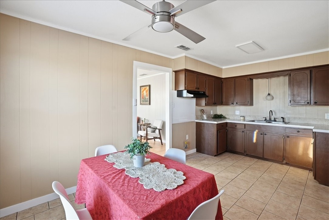 300 Nayer Street Alice, TX 78332 - Photo 10 of 22 a kitchen with a sink cabinets and window