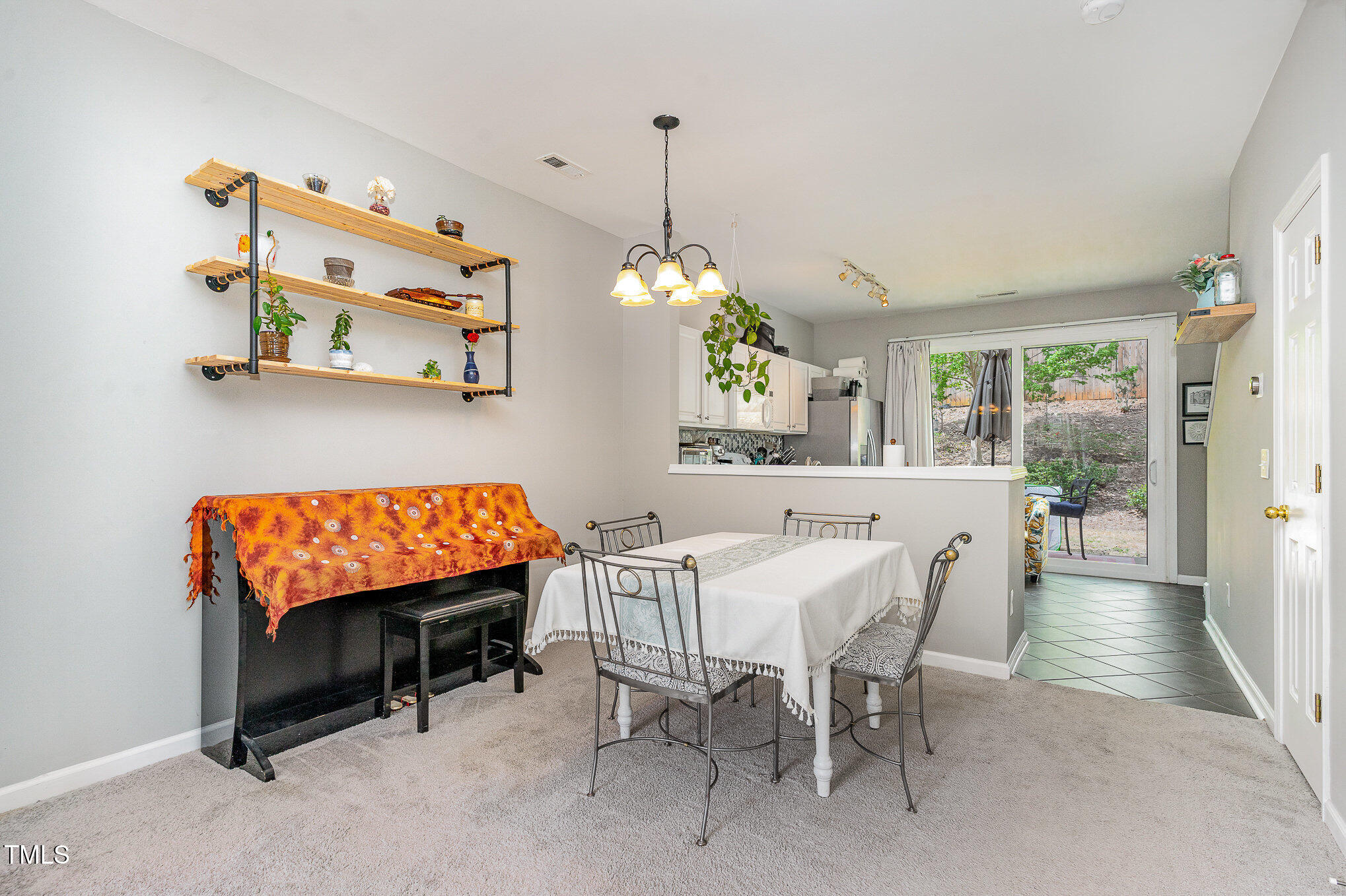 1812 Natalie Brook Way Raleigh, NC 27609 - Photo 8 of 31 a dining room with furniture and window