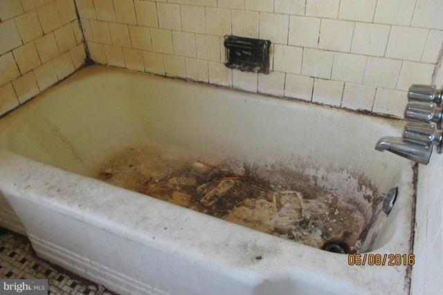 1006 St Dunstans Road Baltimore, MD 21212 - Photo 4 of 9 a bathroom with a shower