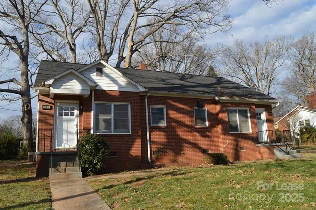 front view of house with a yard