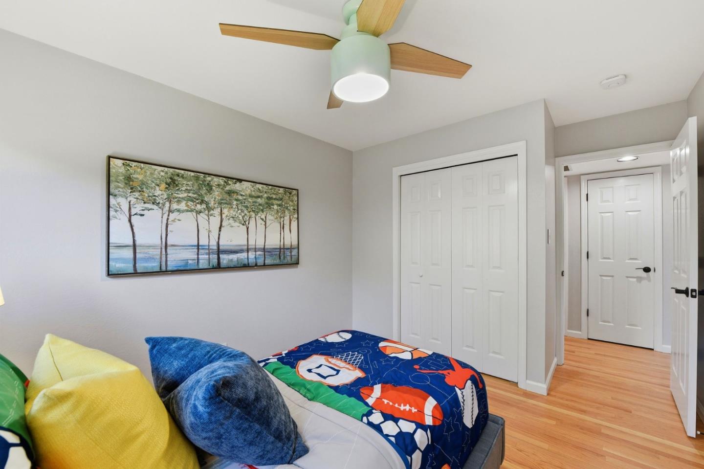 1663 Curtner Avenue San Jose, CA 95125 - Photo 24 of 57 a bedroom with a bed and wooden floor