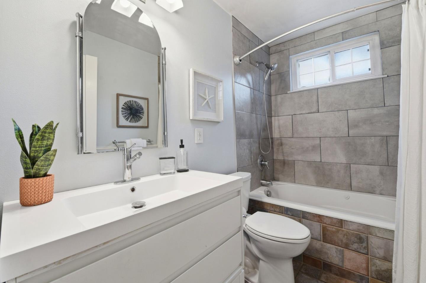 1663 Curtner Avenue San Jose, CA 95125 - Photo 25 of 57 a bathroom with a sink toilet and shower