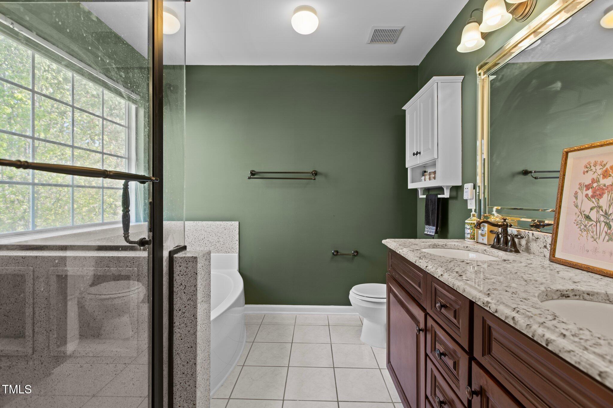 5405 Seaspray Lane Raleigh, NC 27610 - Photo 30 of 48 Primary Bedroom Ensuite