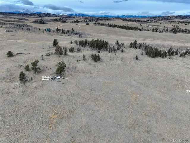 a view of a lake with trees