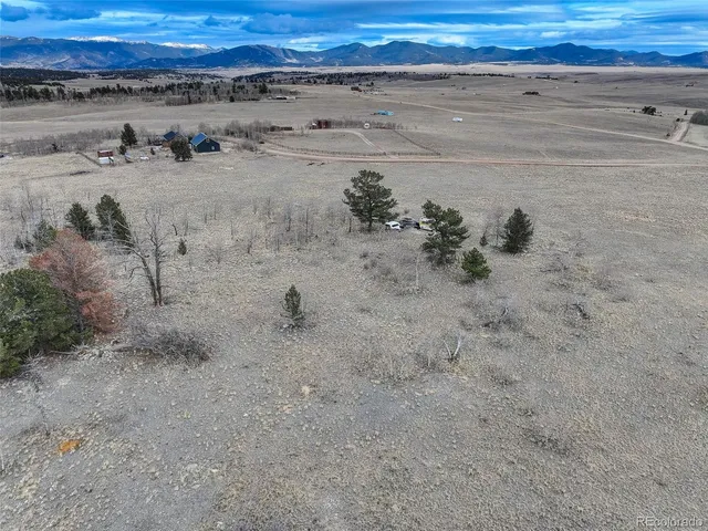 a view of a road with an ocean view