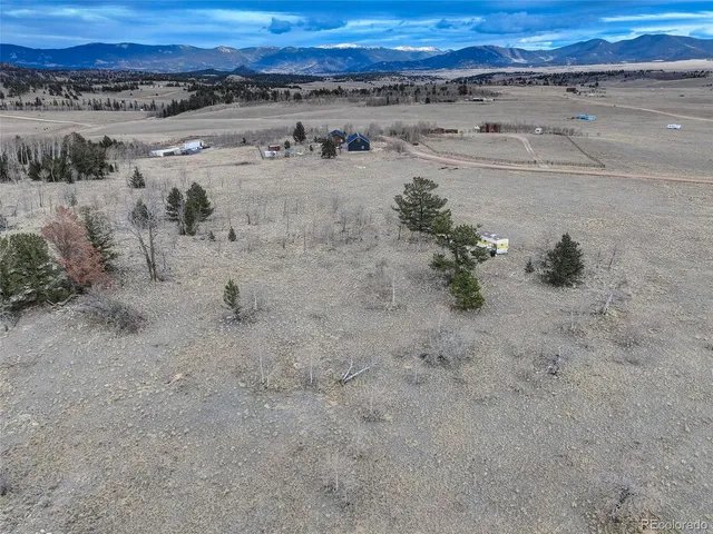a view of a lake with a beach