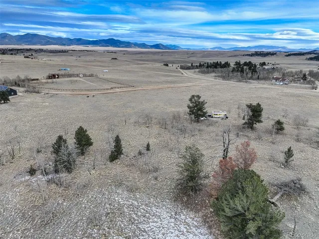 a view of a lake with mountain in the background