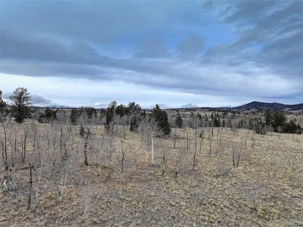 a view of a house with a street
