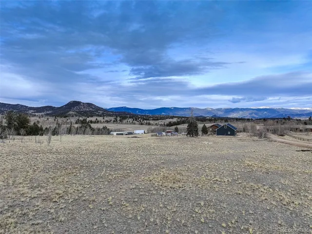 a view of an ocean and mountain