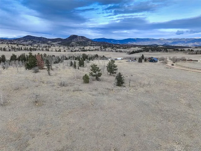 a view of a lake with a mountain