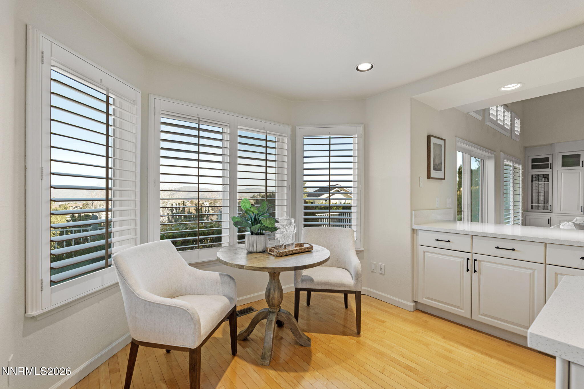 6186 Squires Lane Reno, NV 89519 - Photo 17 of 57 a view of a dining room with furniture and windows