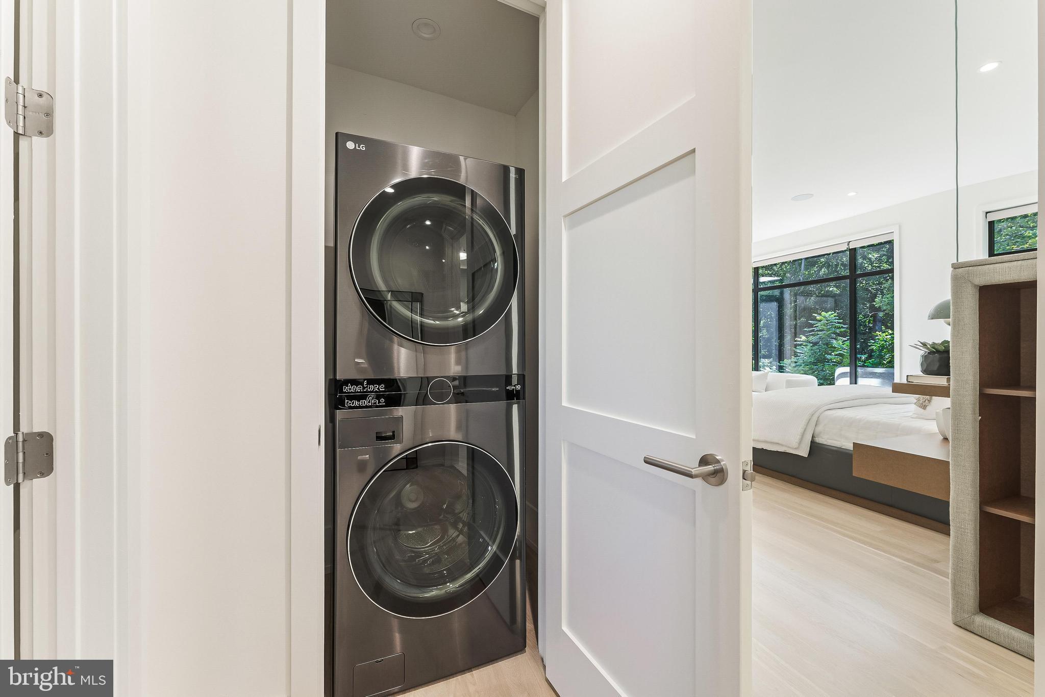 3632 36th Road North Arlington, VA 22207 - Photo 39 of 108 Stacked laundry in corridor with drying racks