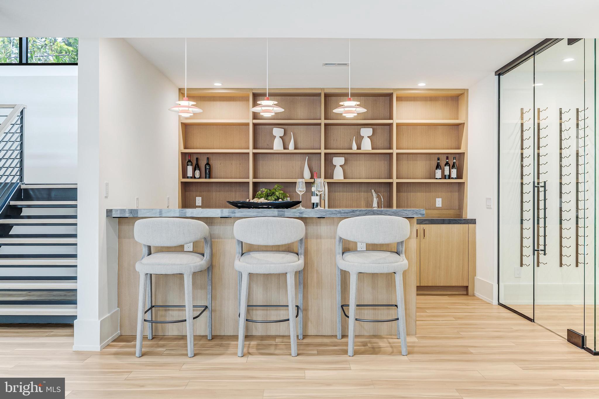 3632 36th Road North Arlington, VA 22207 - Photo 80 of 108 Custom walnut bar w/ double thick quartzite top