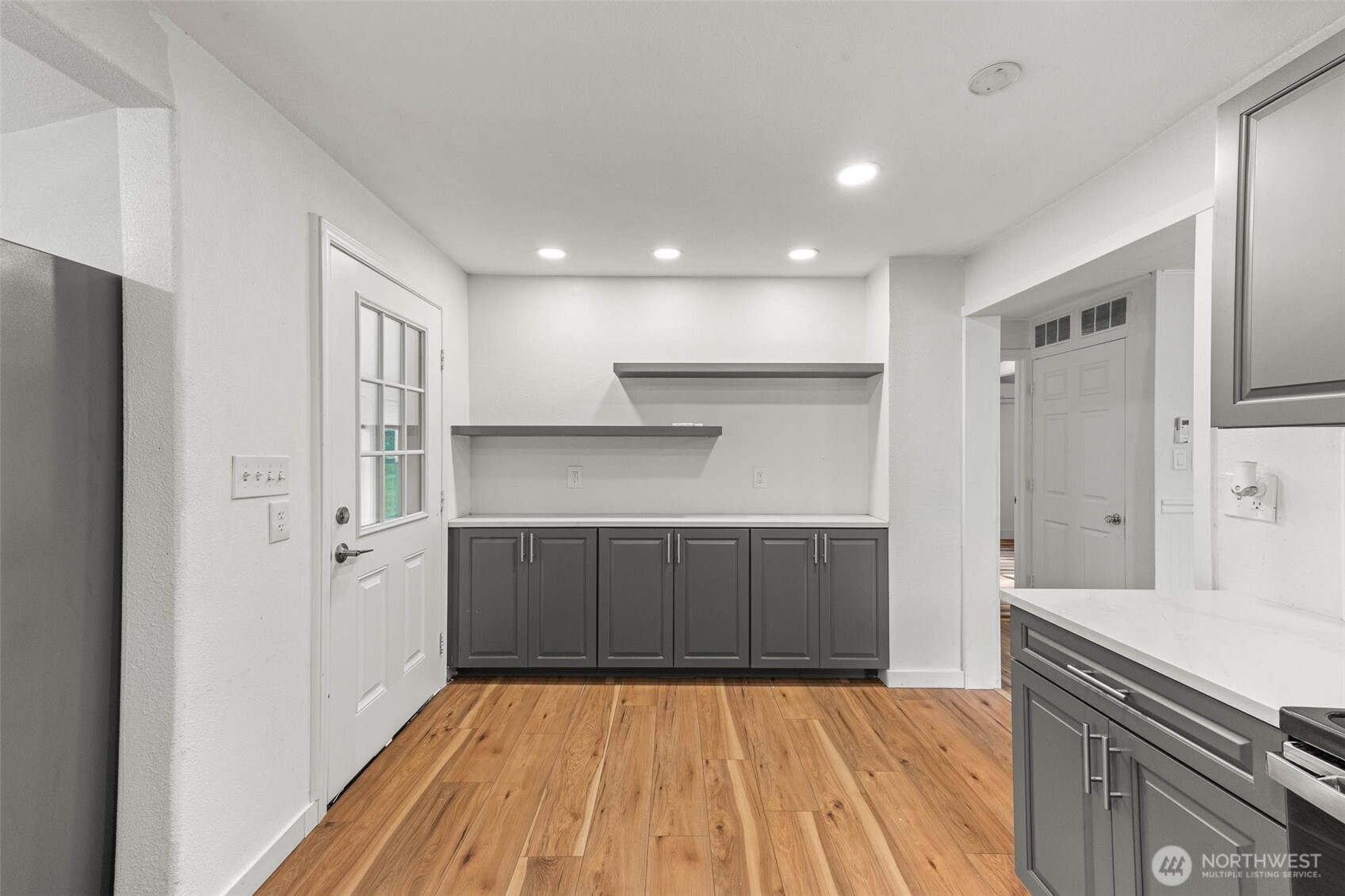 172 South Bank Road Elma, WA 98541 - Photo 13 of 40 a kitchen with a sink and wooden floor
