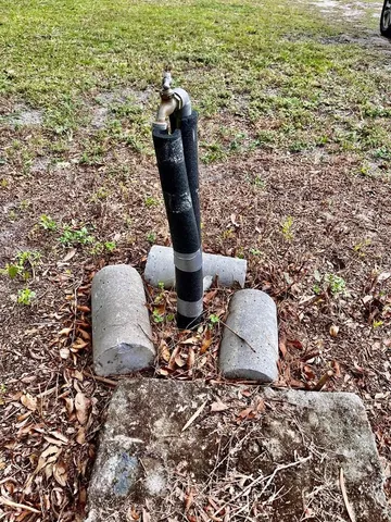 a bedroom with two bed and a dresser