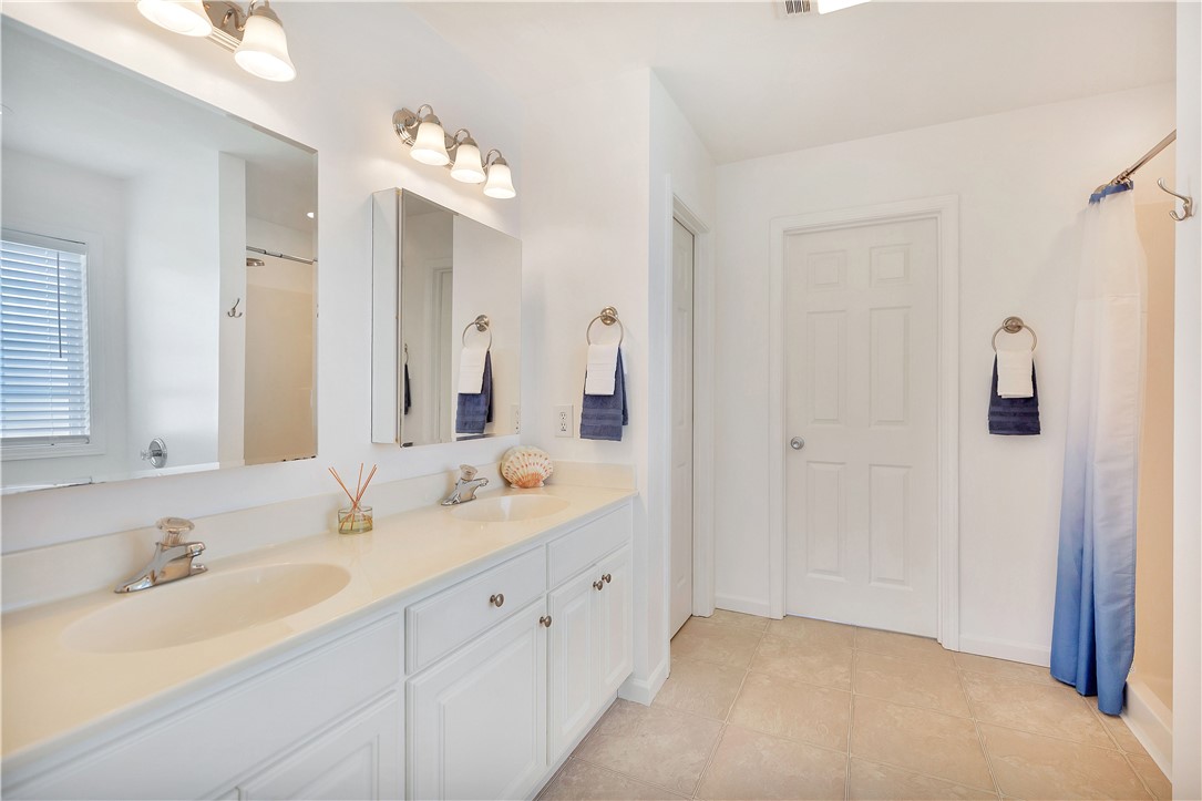 131 Morgan Road West Union, SC 29696 - Photo 12 of 39 Double vanities with ample counter space offer dual convenience in this well-lit bathroom.