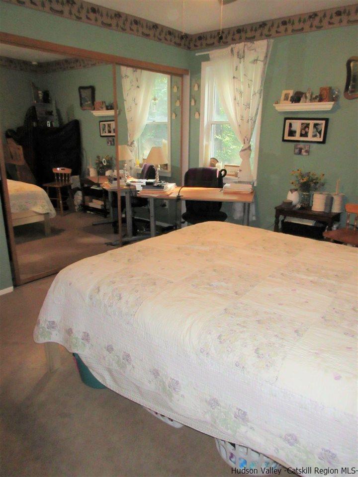 536 Joel M Austin Road Cairo, NY 12413 - Photo 13 of 21 a bedroom with a bed and window