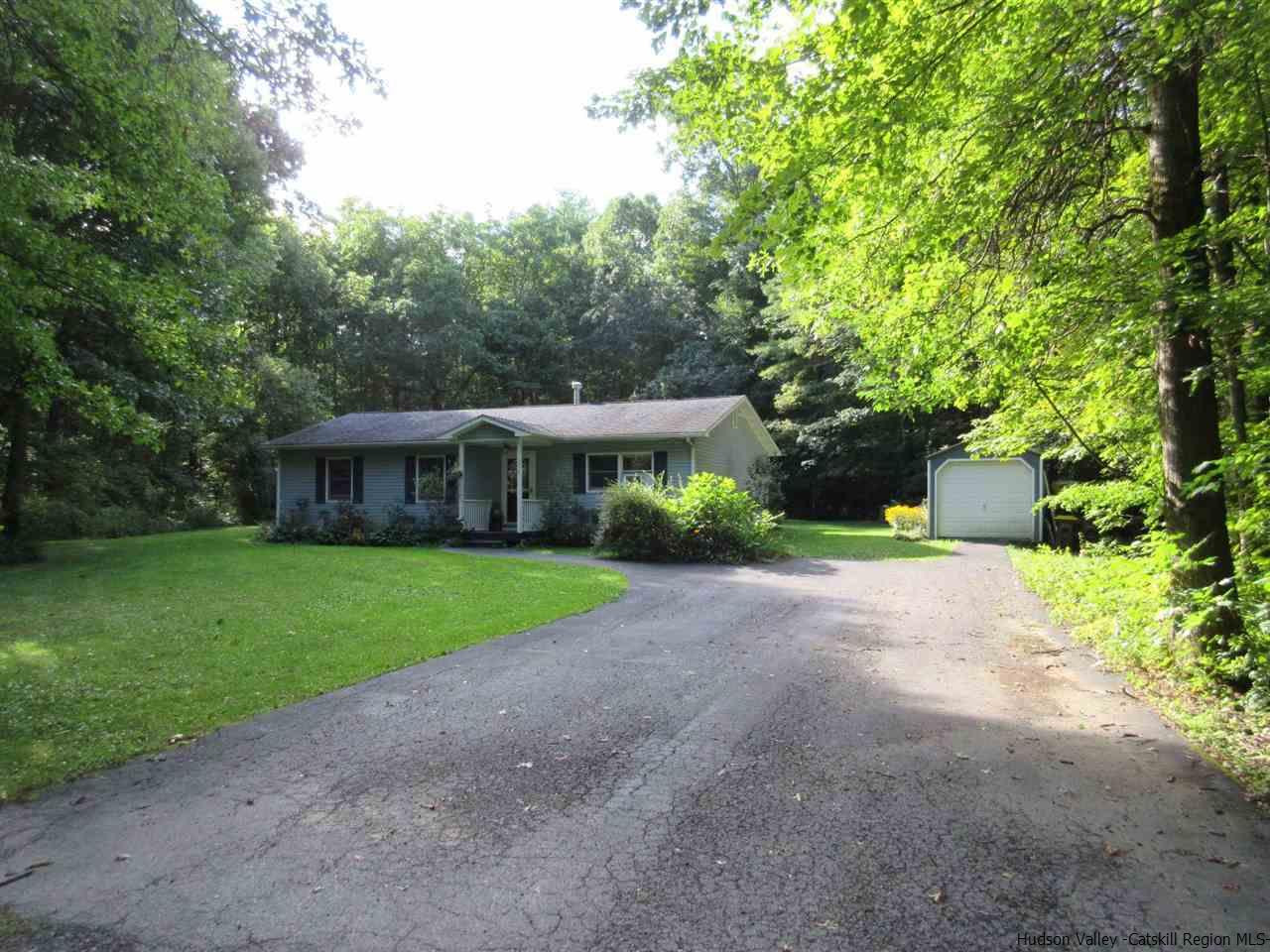 536 Joel M Austin Road Cairo, NY 12413 - Photo 3 of 21 a front view of a house with a yard and trees