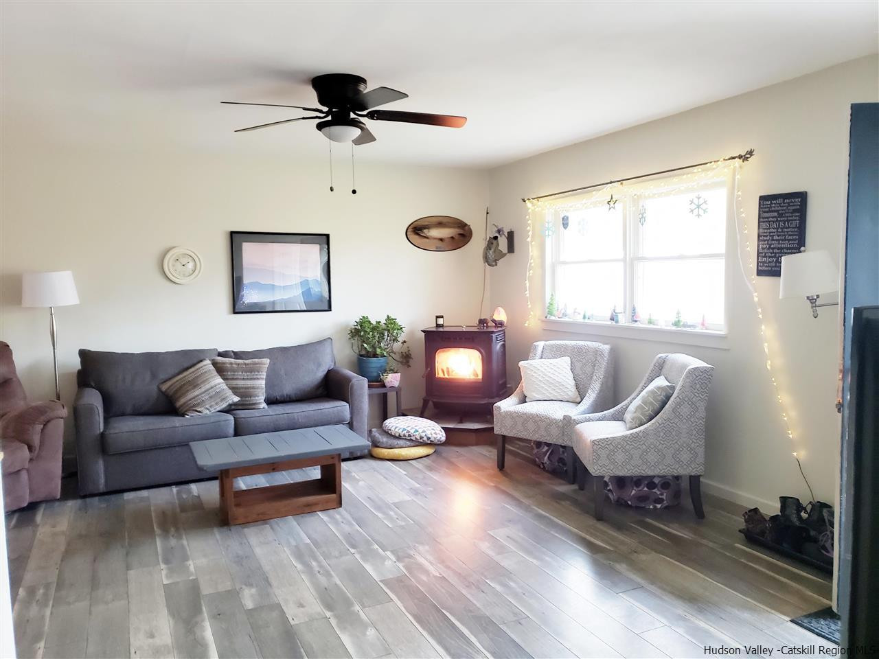 536 Joel M Austin Road Cairo, NY 12413 - Photo 5 of 21 a living room with furniture and a large window