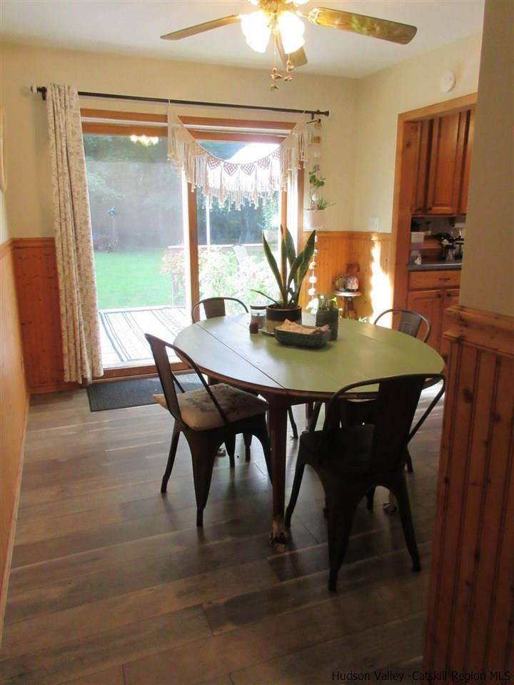 536 Joel M Austin Road Cairo, NY 12413 - Photo 7 of 21 a view of a dining room with furniture window and wooden floor